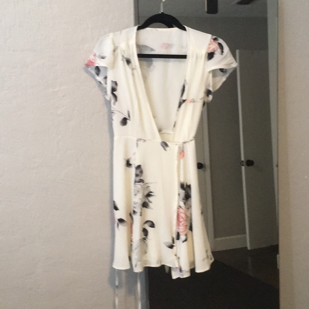 White and floral wrap dress